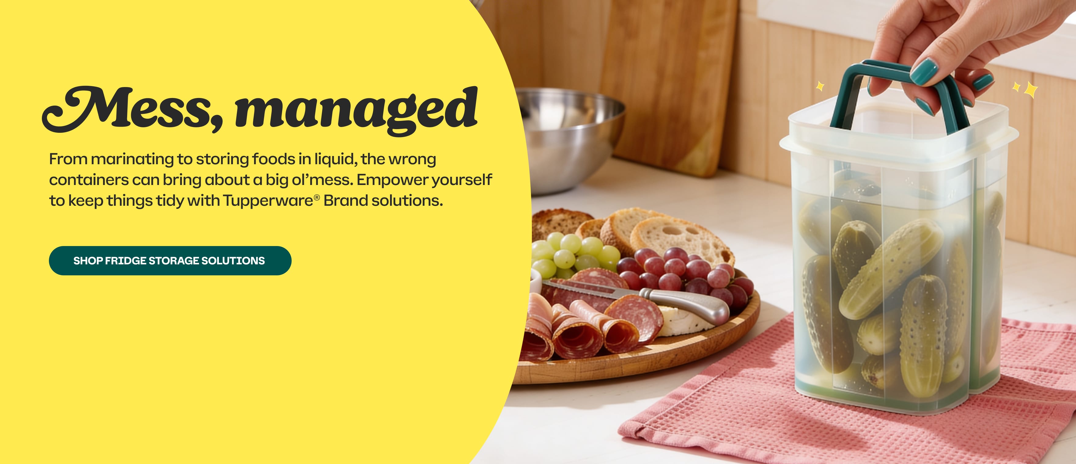 Tupperware container with pickles on a kitchen counter, promotional text about managing food messes. Shop Fridge Storage Solutions.